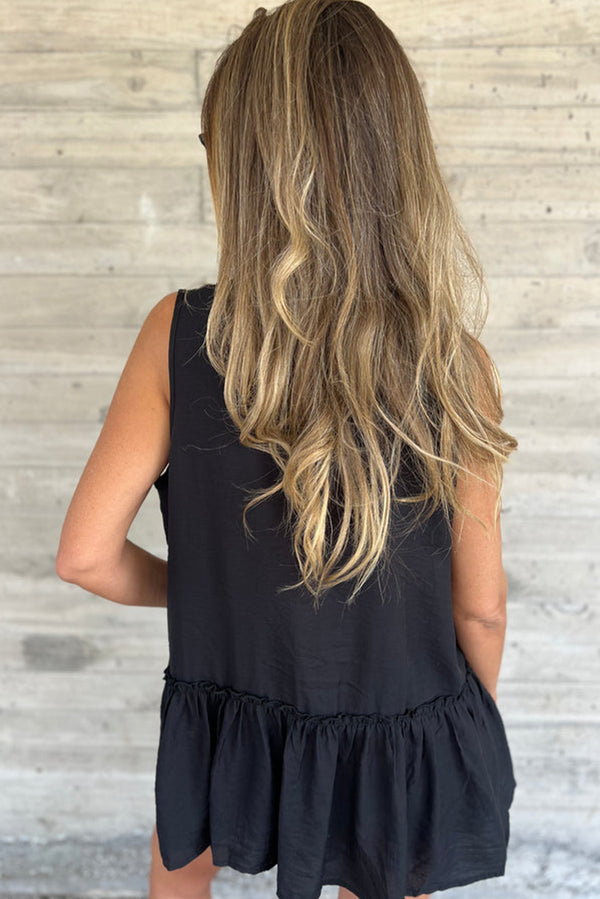 Solange® | Chemise noire unie sans manches avec volants et ourlet volanté
